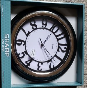 Brand new clock wall in box.